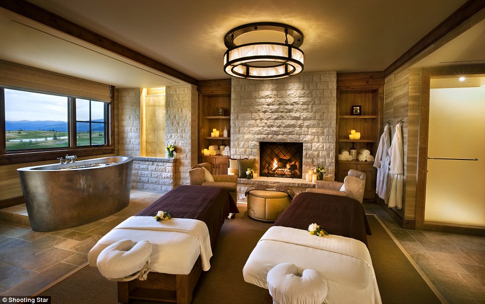 The hotel's couples' suite features an elliptical bath tub, water features and unobstructed southerly views of the Snake River Range