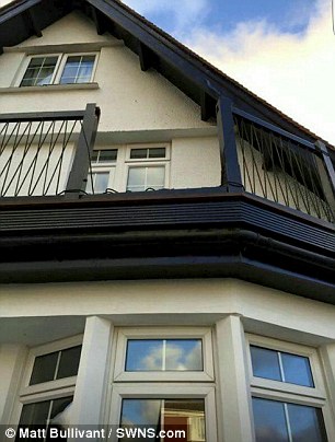 The rotting balcony after Mr Bullivat crashed through the ledge