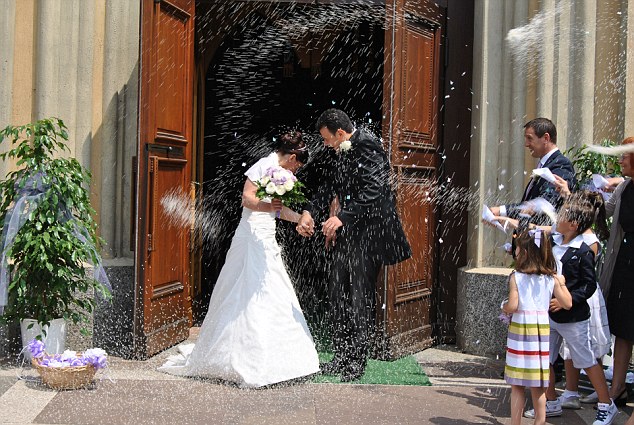 Mr and Mrs Benetti, who work for the same iron and steel flange manufacturer near Milan, married in Italy on June 23 2012