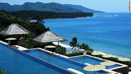 Amankilas signature three-tiered pool. Youll never look at swimming the same.