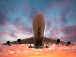 E4T9K7 Illustration of airplane taking off at sunset