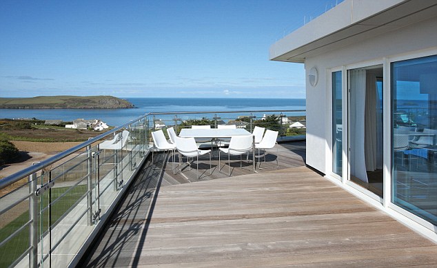 Balcony with a view: The St Moritz Hotel in Cornwall is a top bet for honeymooners keen to stay in the UK