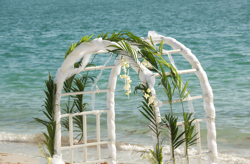 Beach wedding // Photo by Lindsay Clark