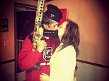 Gun violence: Kelly, pictured her with her presumed boyfriend toting an AR-15 gun, could spend five years in prison if convicted