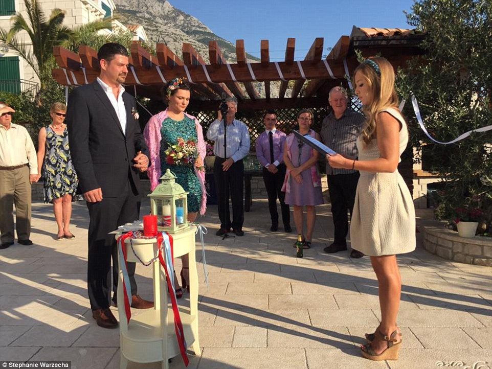 While most newlyweds enjoy a romantic honeymoon together after their wedding, Stephanie Warzecha (pictured with her husband Doug on their wedding day), 31, has ditched tradition and opted for something completely different