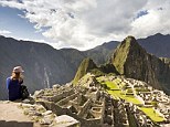 Tourist looking at Machu Picchu