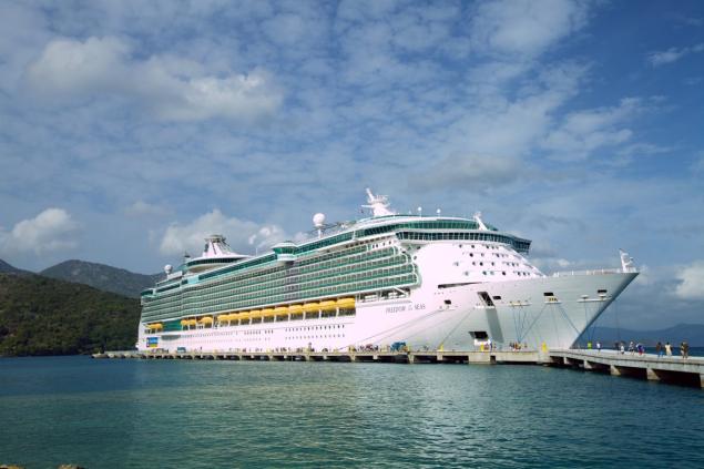 Freedom of the Seas, a cruise ship operated by Royal Caribbean International, at Royal Caribbean’s private beach in Labadee, Haiti.