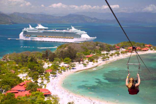 When the Freedom of the Seas docks at Royal Caribbean’s private beach resort in Labadee, Haiti, passengers can relax on the beach, enjoy lagoon-like bays surrounded by forested mountains, and take part in water sports and activities, including a zip line.
