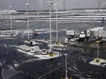 A JetBlue aircraft is seen parked at JFK International Airport in New York February 22, 2015. Icy weather closed Kennedy Airport around 7:45 this morning as crews worked to clear the runways of ice, slush and snow according to local media reports from the Port Authority. The airport has since re-opened with lengthy delays for travelers. REUTERS/Shannon Stapleton (UNITED STATES - Tags: ENVIRONMENT SOCIETY TRANSPORT)
