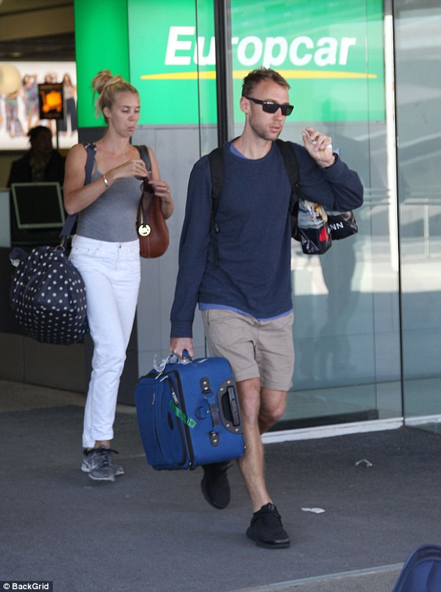 Travelling light? After spending a couple of weeks on their honeymoon, the couple arrived back in Brisbane seemingly with just hand luggage on them 
