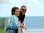It's a family affair: Molly and her dad Lee breathe in the sea air on the deck of the Ventura cruise ship
