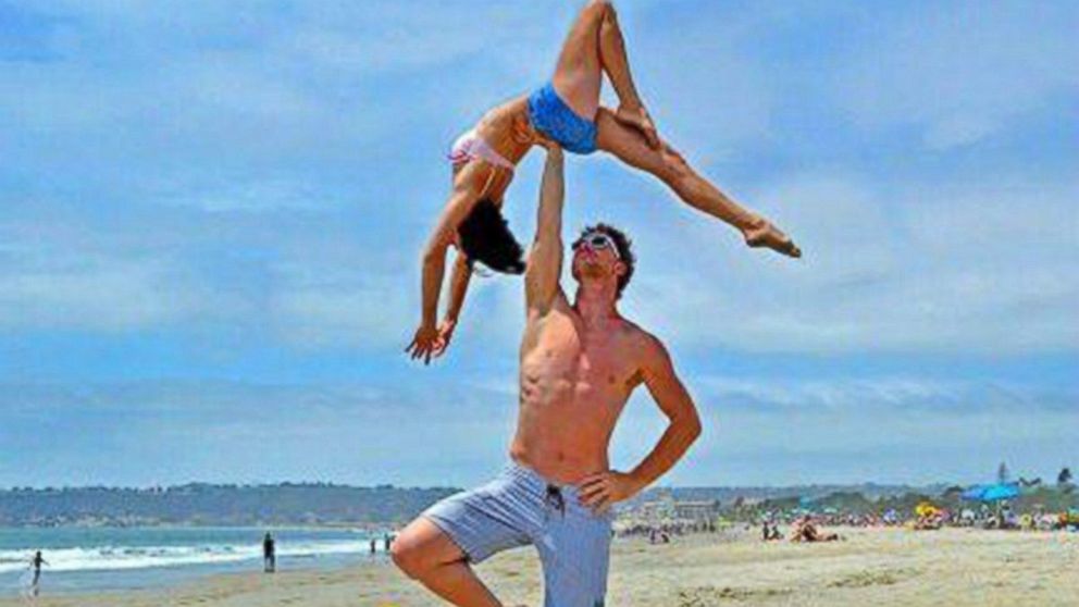 PHOTO: Cheetah Platt and Rhiann Woodyard, both acrobats, are traveling through 12 countries to celebrate their wedding with 20 ceremonies. 