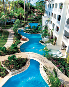 The swim-up suites at Sandals Barbados include a private patio with circular soaking tub for two and en-suite spa-style bathroom.
