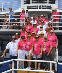 Their T-shirts read: “I kept calm because I called The Cruising Lady.”